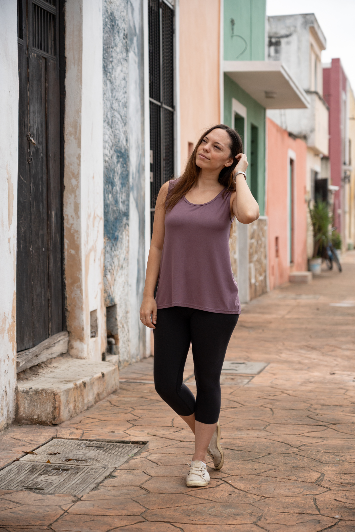 Close-up of woman wearing the taupe reversible bamboo camisole, front view.