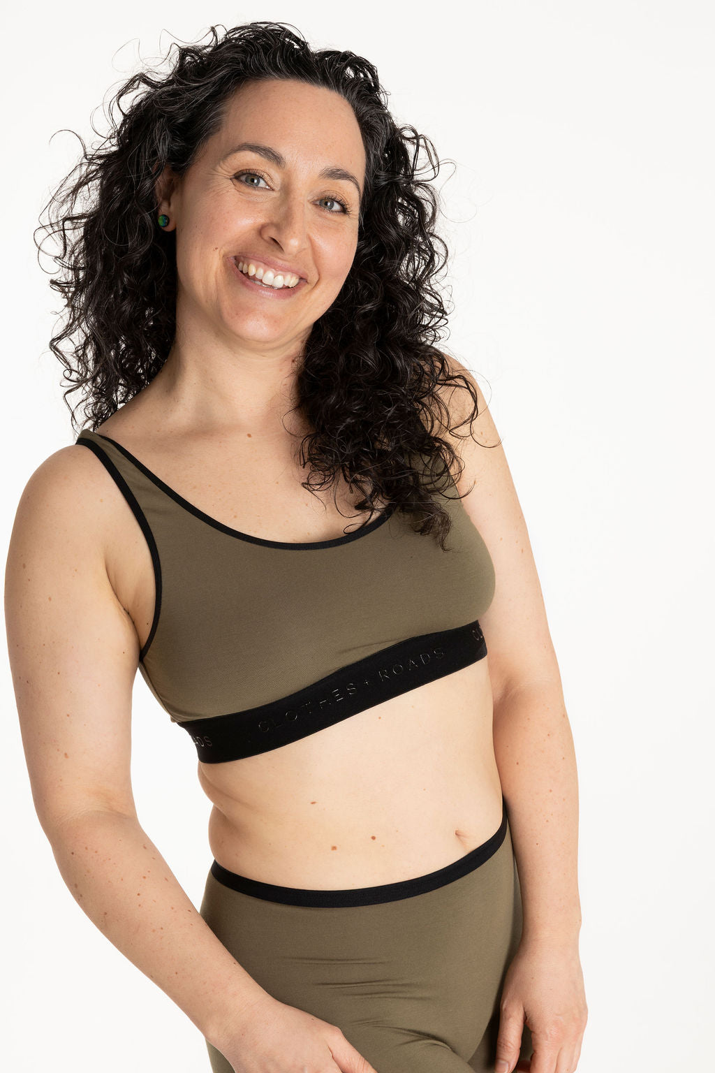 Close-up of olive bralette and olive long women's boxer