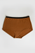 Orange underwear with black waistband on a white background