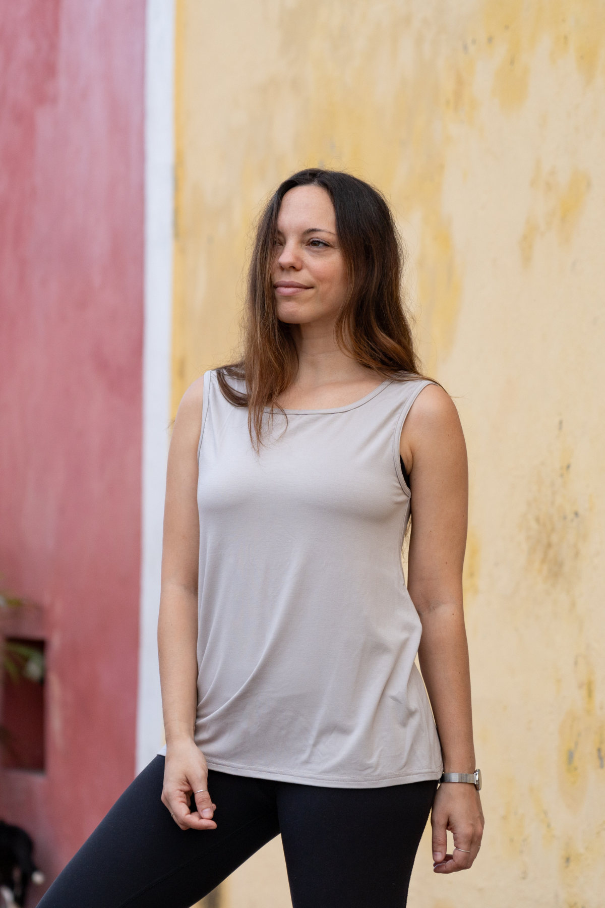 Close-up of woman wearing the taupe reversible bamboo camisole, front view.
