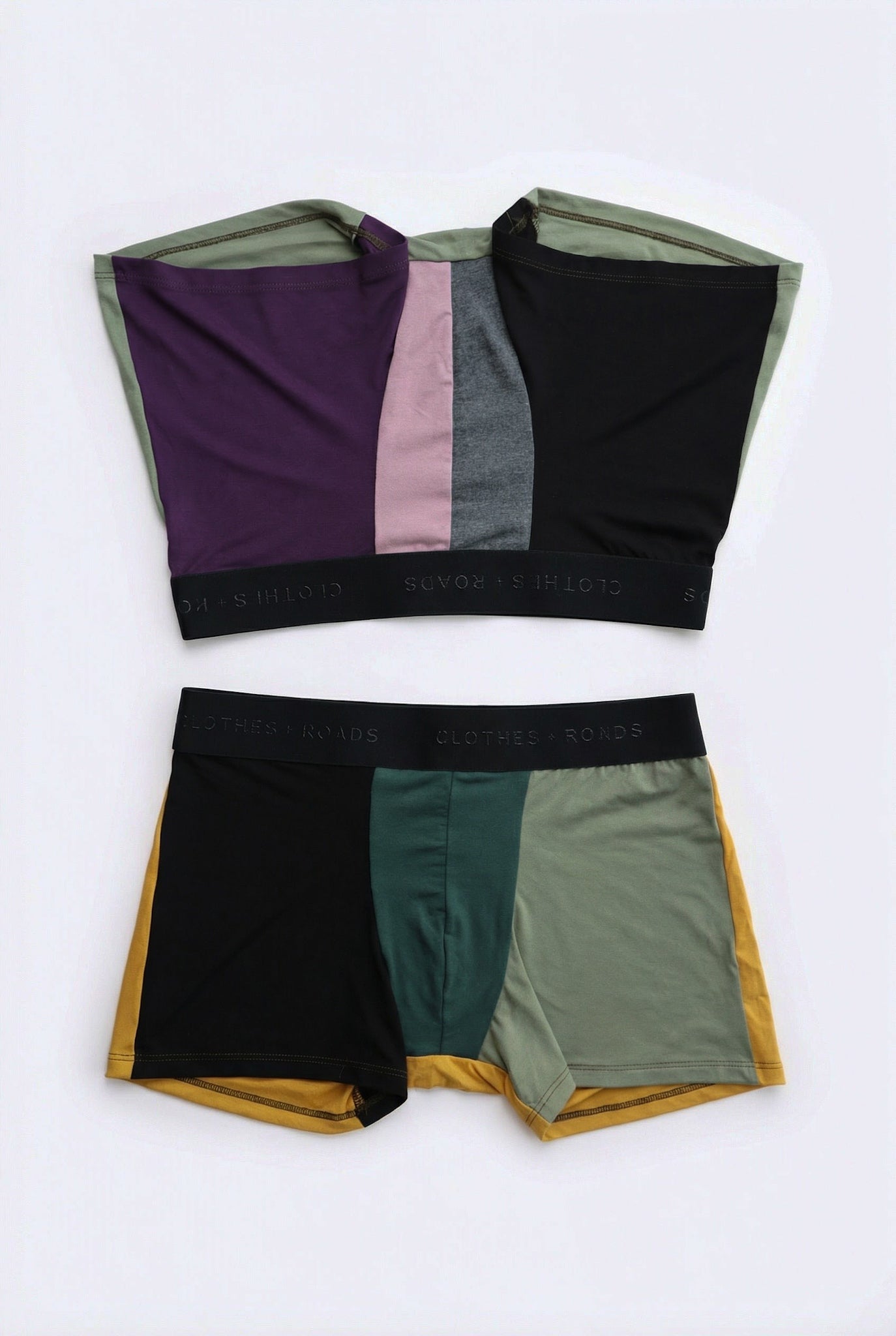 Two pairs of color-blocked men’s underwear on a white background